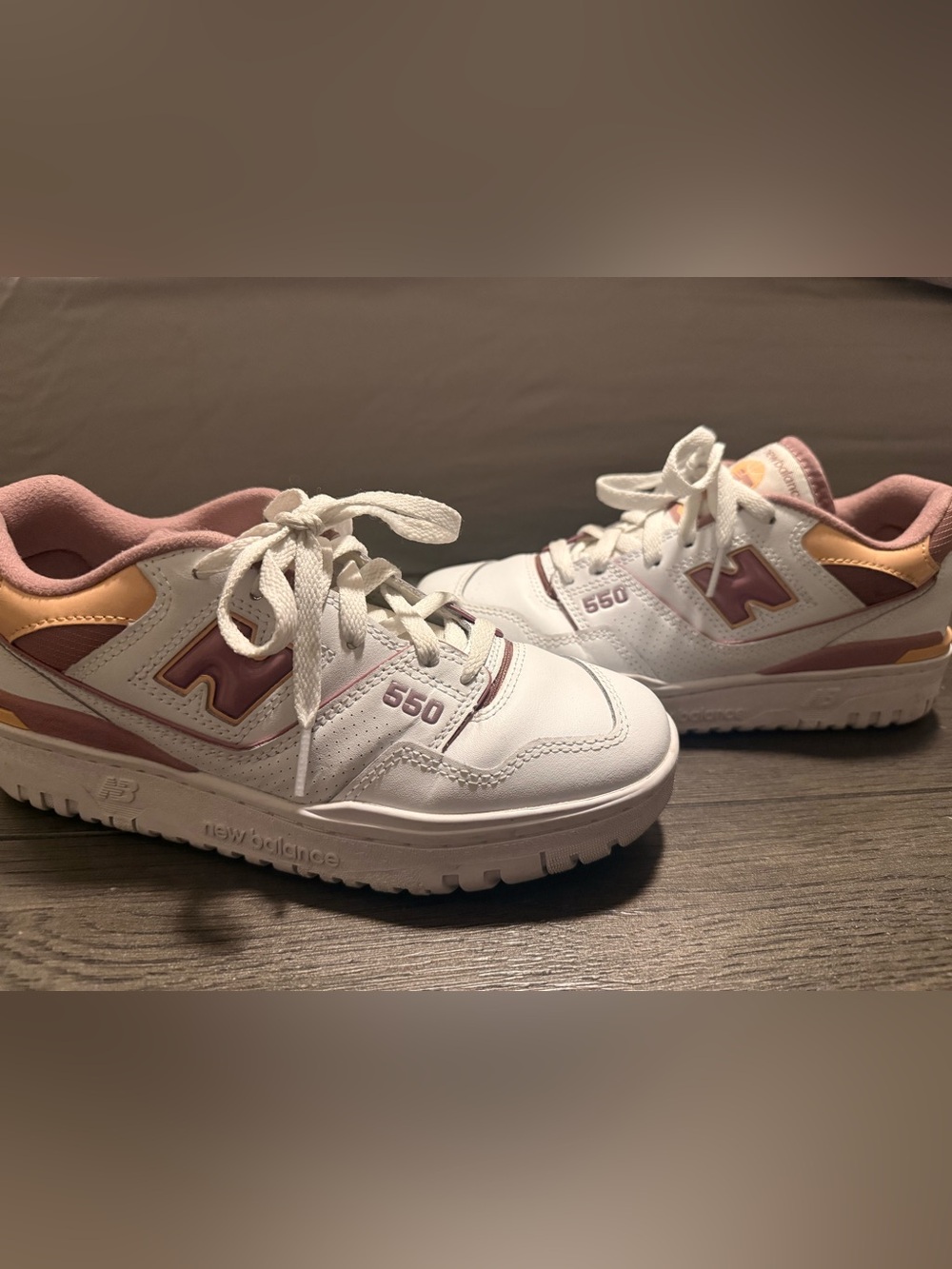 New Balance women’s 550 White and Pink Accent Sneakers